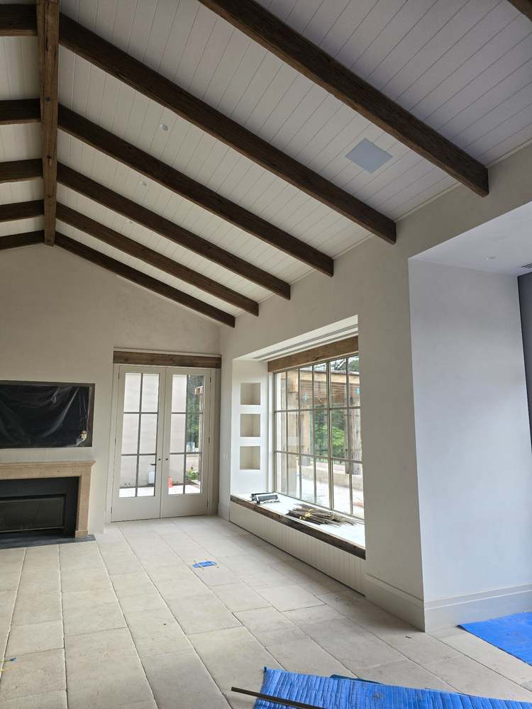Painted interior with exposed beams